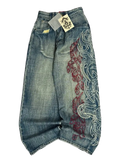 Bloodline Jeans - washed blue baggy denim with red and white tribal flame embroidery down the leg