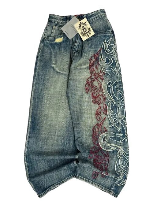 Bloodline Jeans - washed blue baggy denim with red and white tribal flame embroidery down the leg