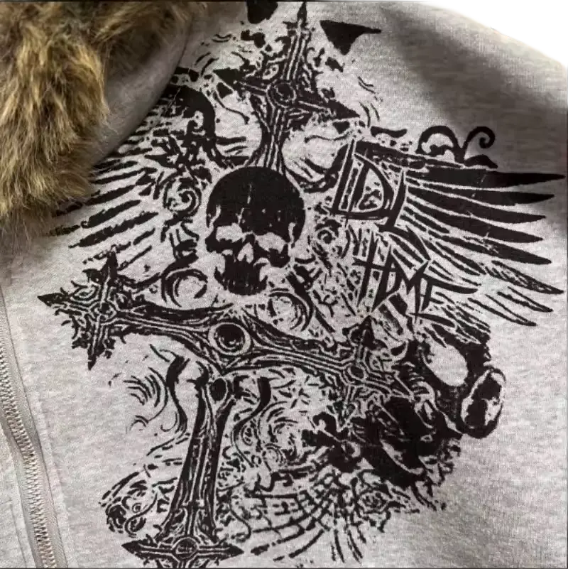 Idle Time Hoodie graphic closeup - skull winged cross detail